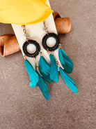 Boucles d’oreilles LIZA longues plumes turquoise