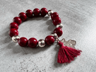 Bracelet pompon SIMON perles bordeaux